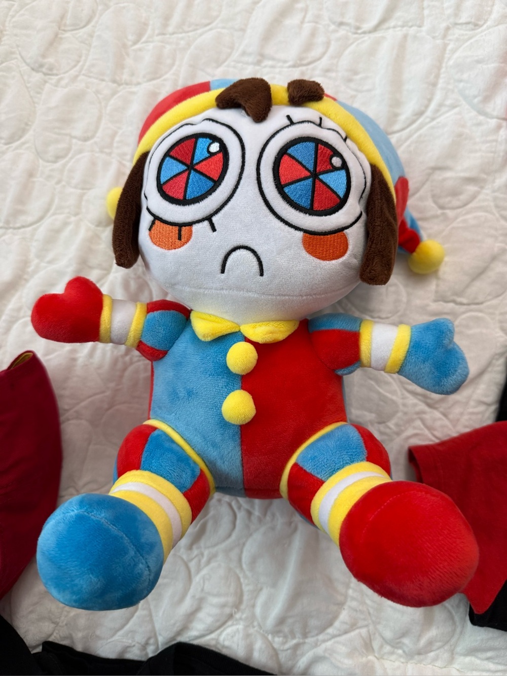 The amazing digital circus . Cap and 2 dolls ( Pomni and ragataha